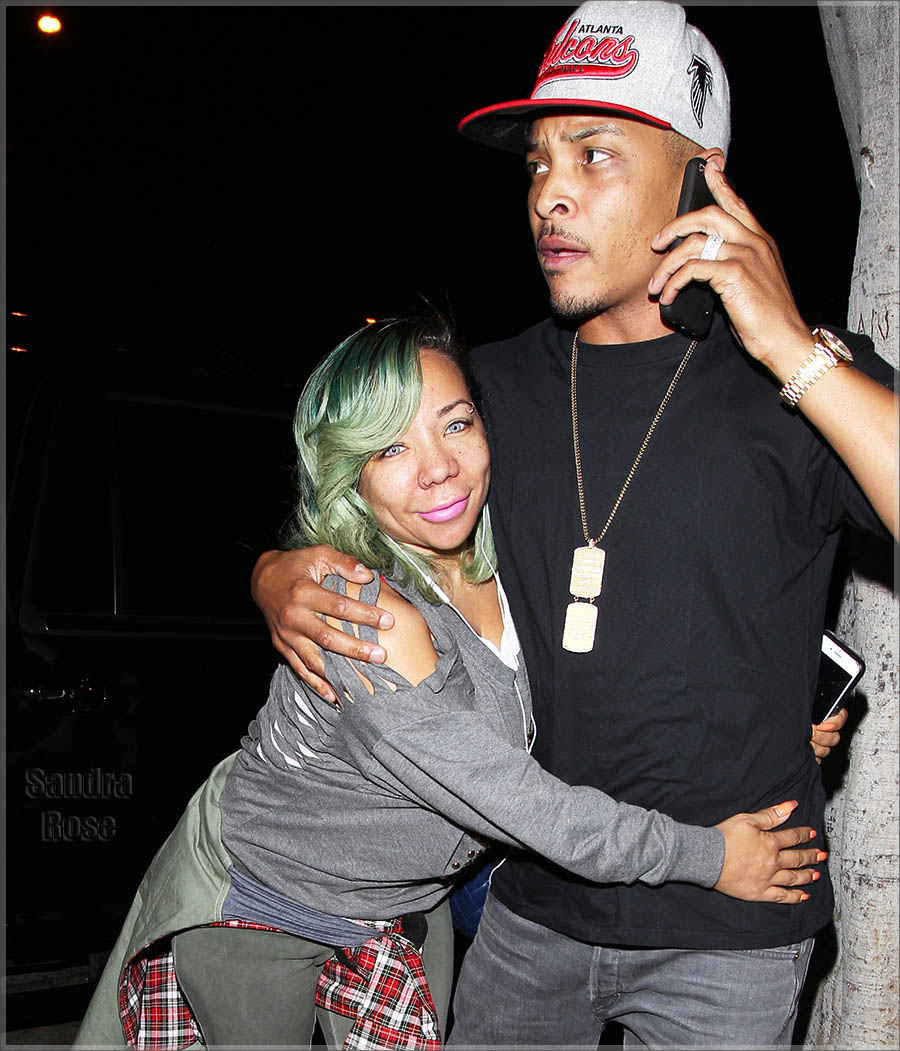 T.I. and his wife Tameka Cottle arrive at Madeo restaurant