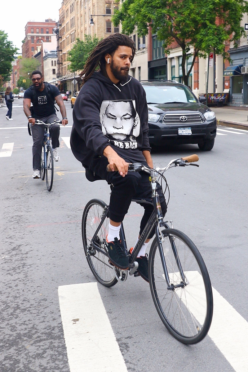 J. Cole was spotted taking a bike ride this afternoon in NY’s Tribeca