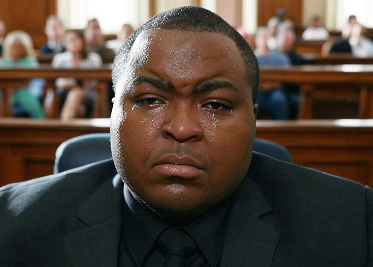 Photo of Sean Kingston crying in court