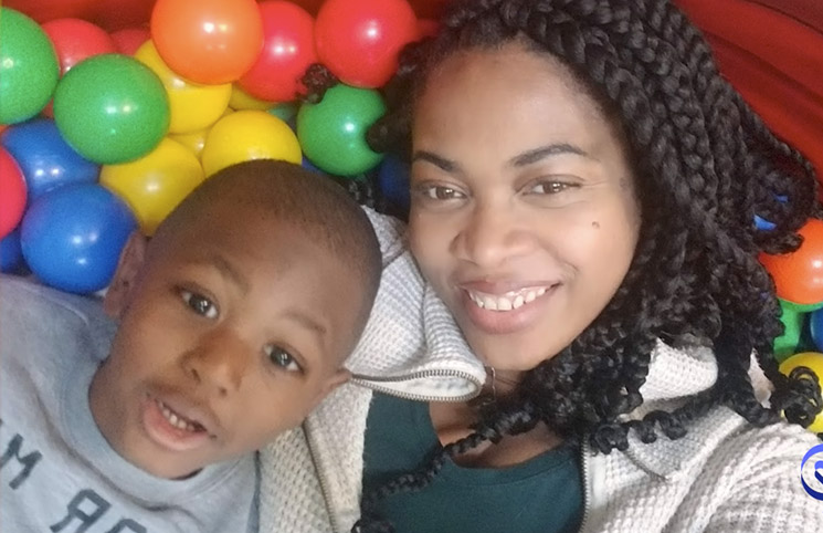 Photo of April D and son