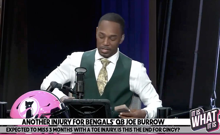 Photo of Cam'Ron counting cash