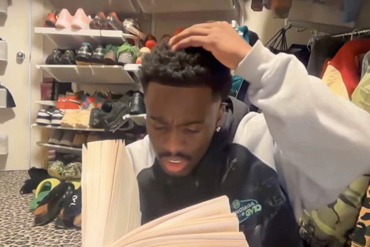 Photo of Kai Cenat learning how to read