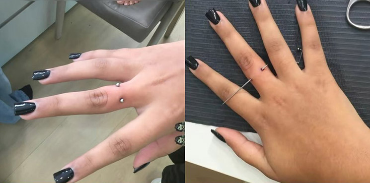 Photo of North West's finger piercing