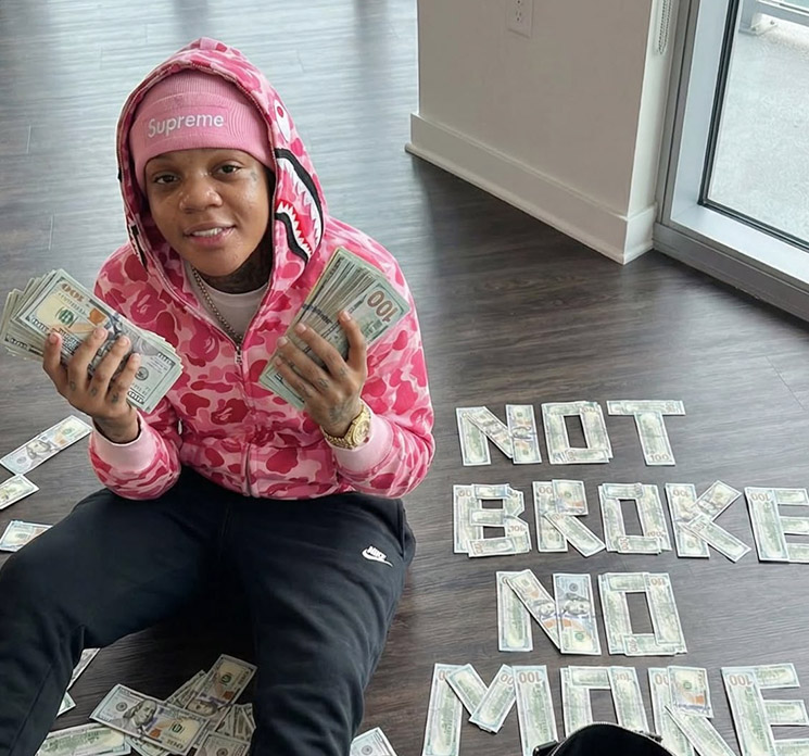 Photo of ScarFAce flashing cash money