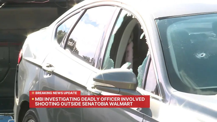 Photo of bullet-riddled car
