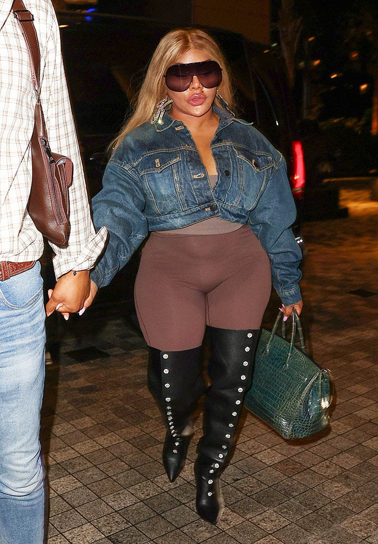 Photo of Lil Kim and Tayy Brown
