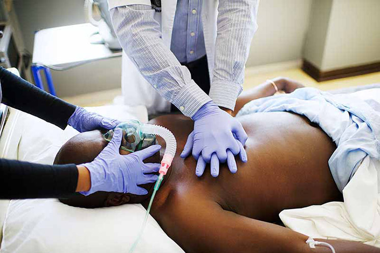 Photo of doctors giving CPR