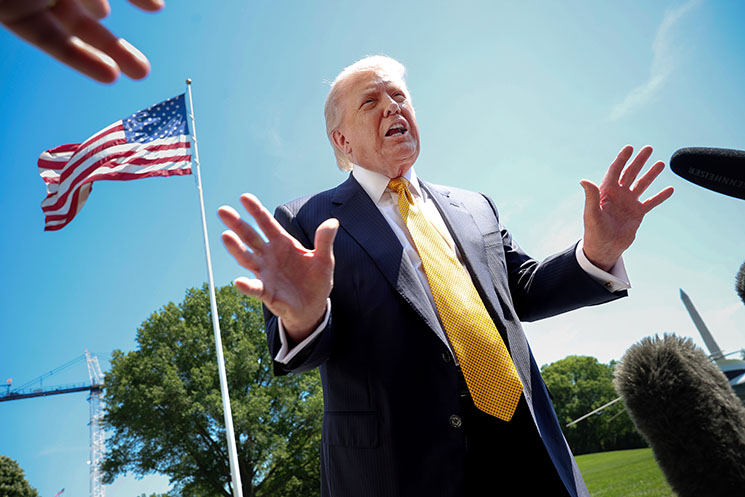 Photo of President Donald Trump speaking to reporters