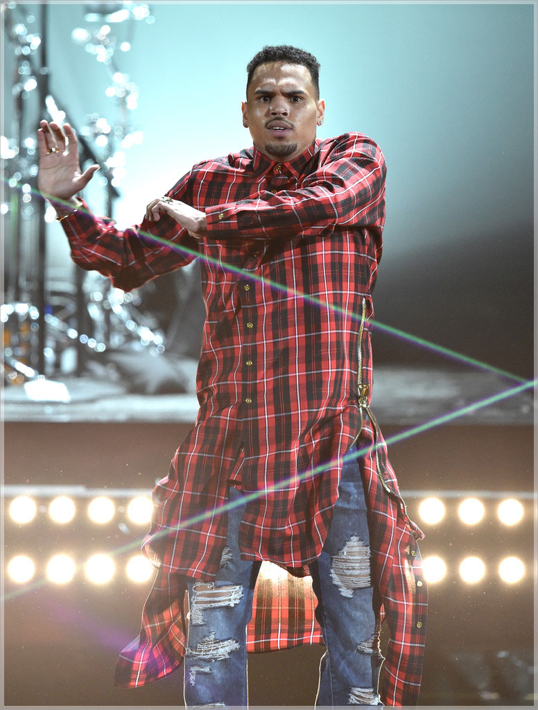 Chris Brown wearing custon plaid extended button shirt dress
