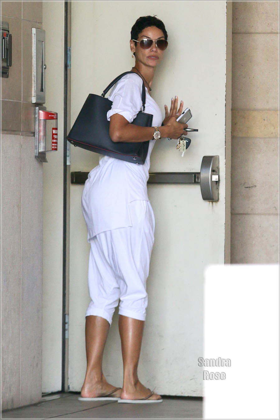 Nicole Murphy leaves a building in Beverly Hills