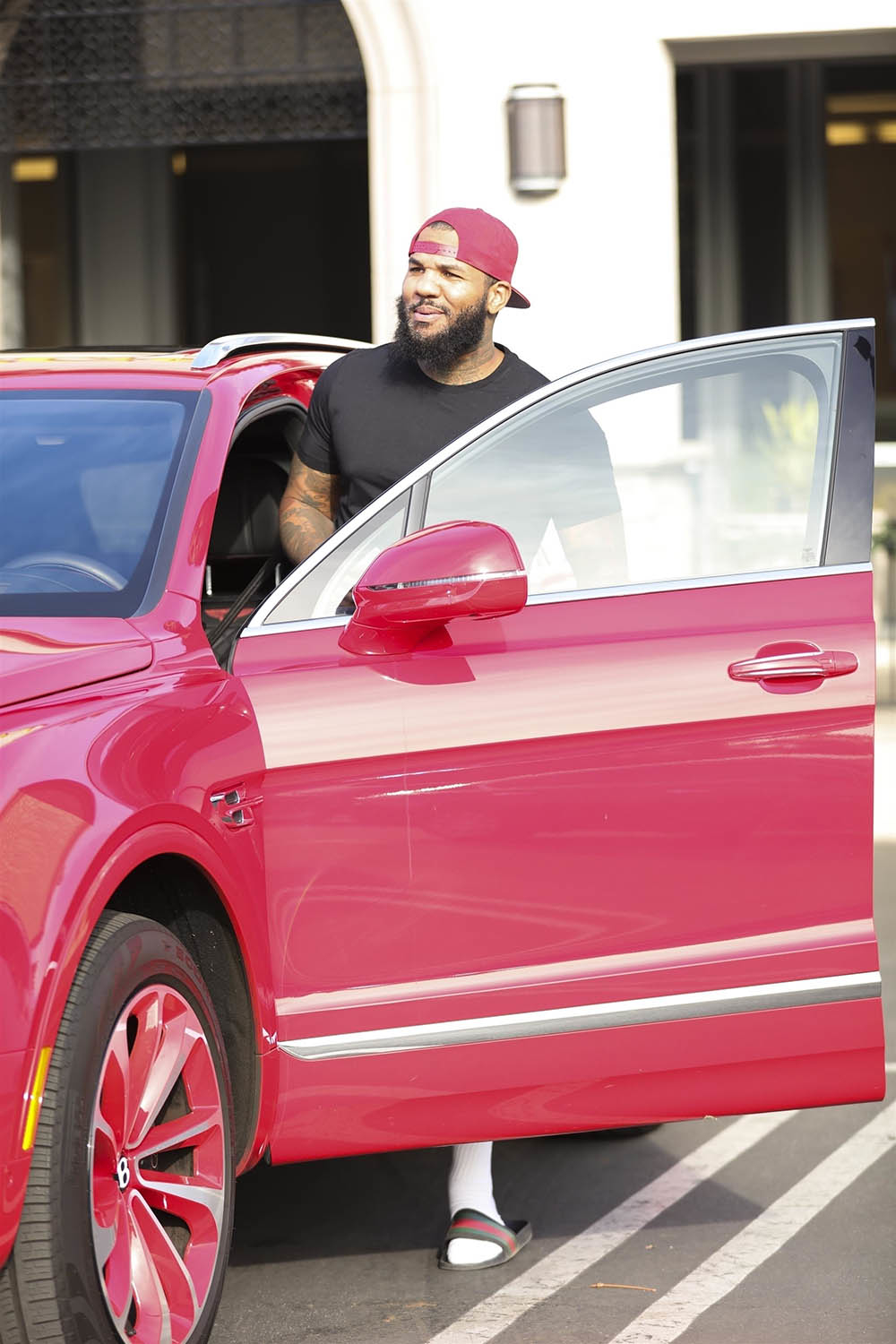 The Game leases red Bentley Bentayga for the holidays | Sandra Rose