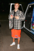 Justin Bieber stops to chat with photographers after leaving Selena Gomez's house
