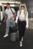 Kim Zolciak and husband share a kiss in LAX Airport
