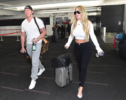 Kim Zolciak and husband share a kiss in LAX Airport