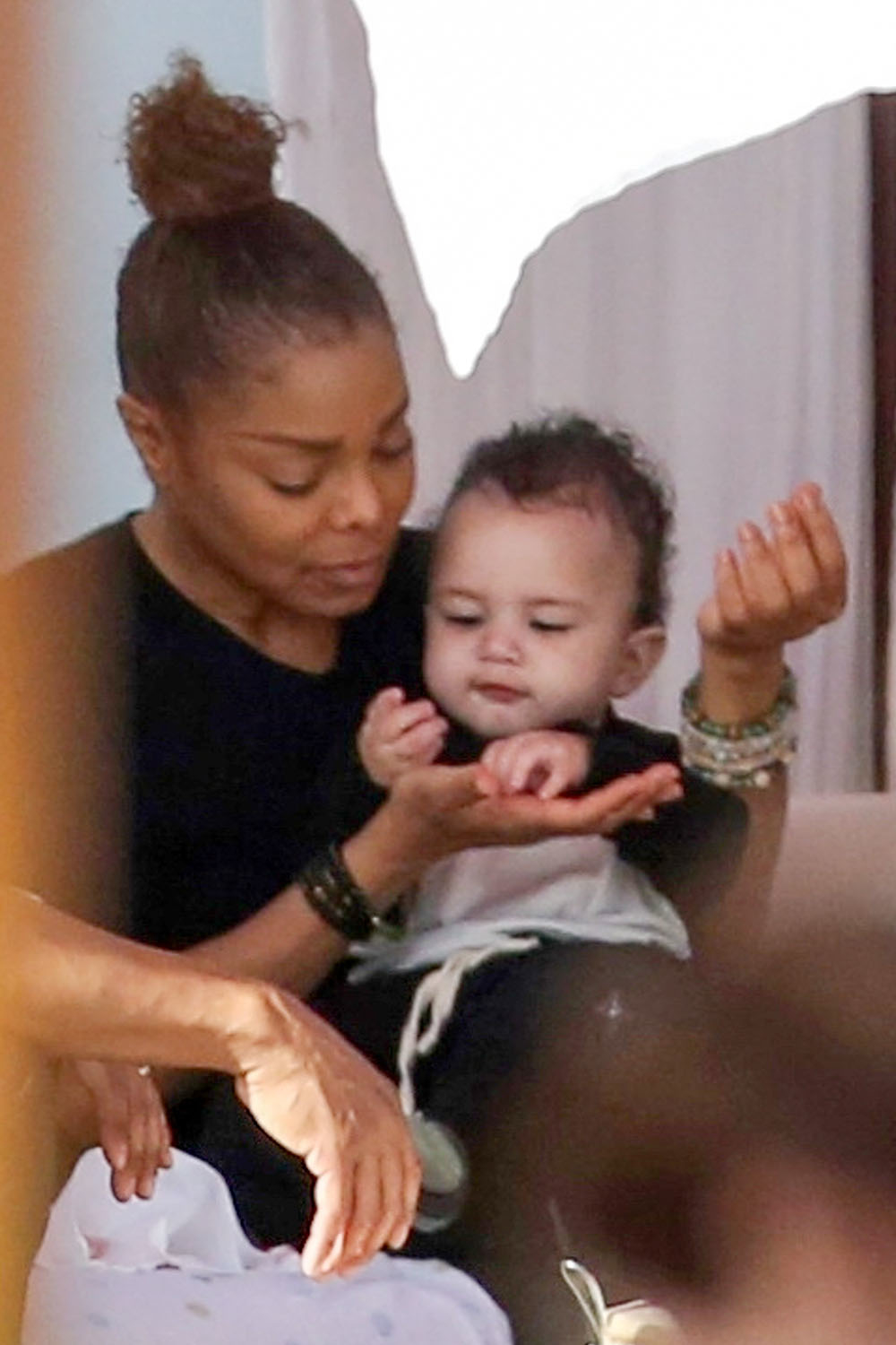 Jackson feeds baby son Eissa in Miami Beach, Florida Sandra Rose