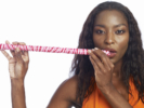 Woman Eating Stick of Candy