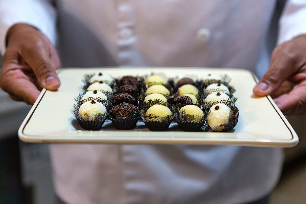 Man serving chocolate