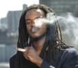 African man smoking marijuana