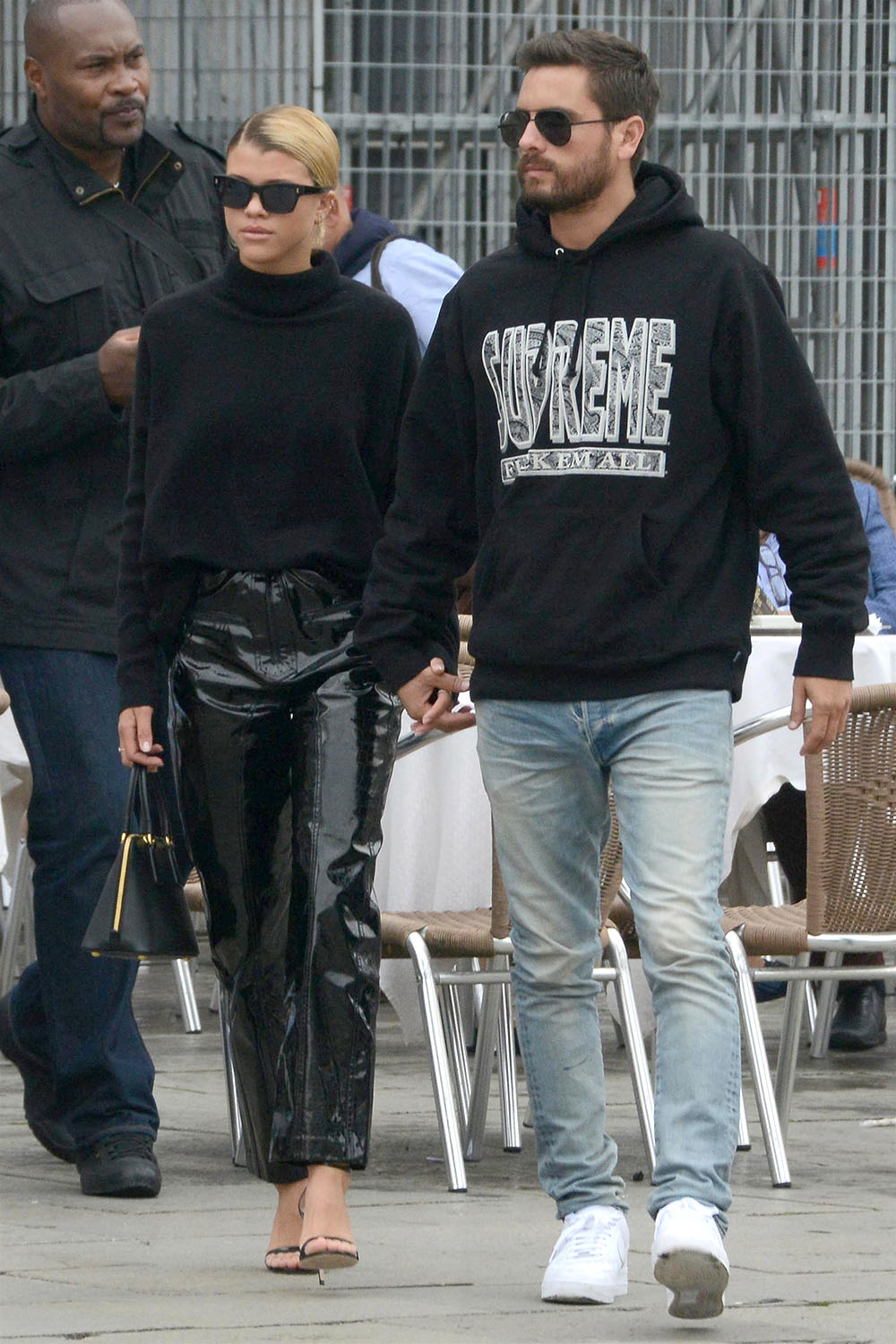 Sofia Richie and her boyfriend Scott Disick hold hands in Italy