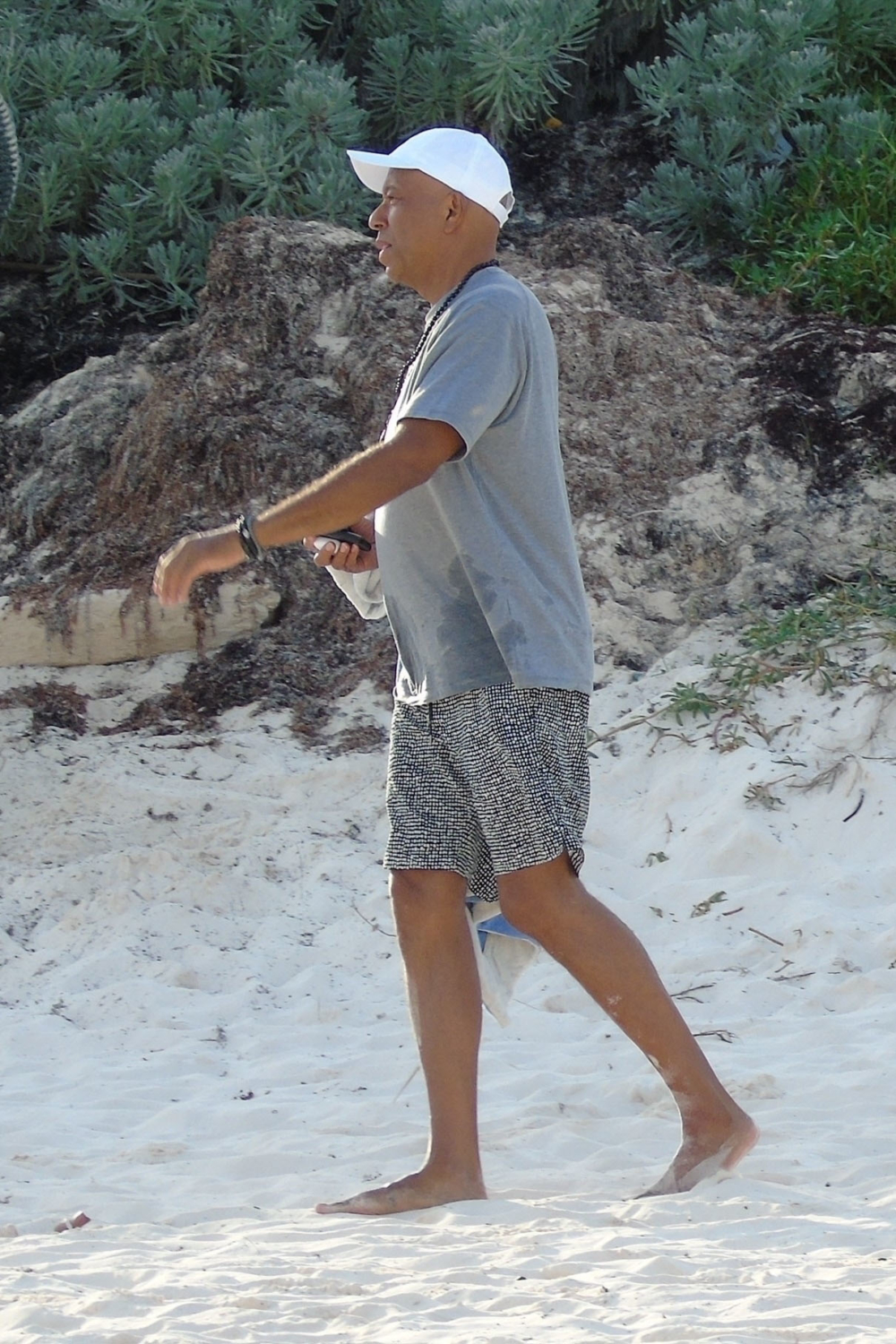 Russell Simmons is spotted enjoying the beach with his family on New Year's Day
