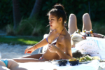 Cassie shows off her bikini body at poolside in Miami