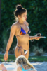 Cassie shows off her bikini body at poolside in Miami