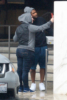 Usher braves the rain to shop for shoes in Beverly Hills