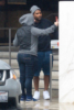 Usher braves the rain to shop for shoes in Beverly Hills