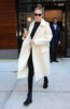 Gigi Hadid wears white alpaca wool coat in New York