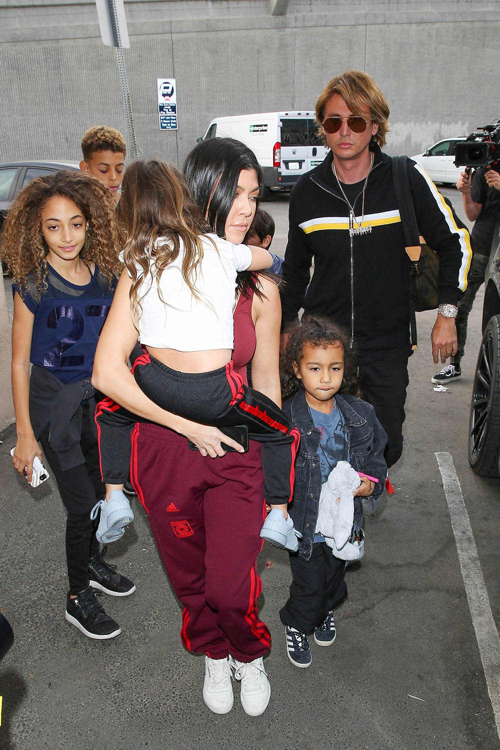 Kourtney Kardashian babysits her niece North West and Scottie and Larsa Pippen's kids