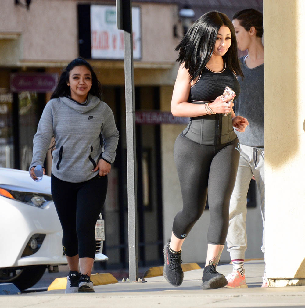 Blac Chyna wears a waist trainer while out for a jog with friends