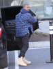 Kanye West arrives at his Calabasas office in a happy mood