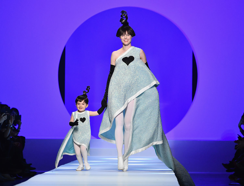 Coco Rocha and her daughter Ioni walk for Jean-Paul Gaultier