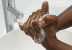 African American hand washing scrub technique