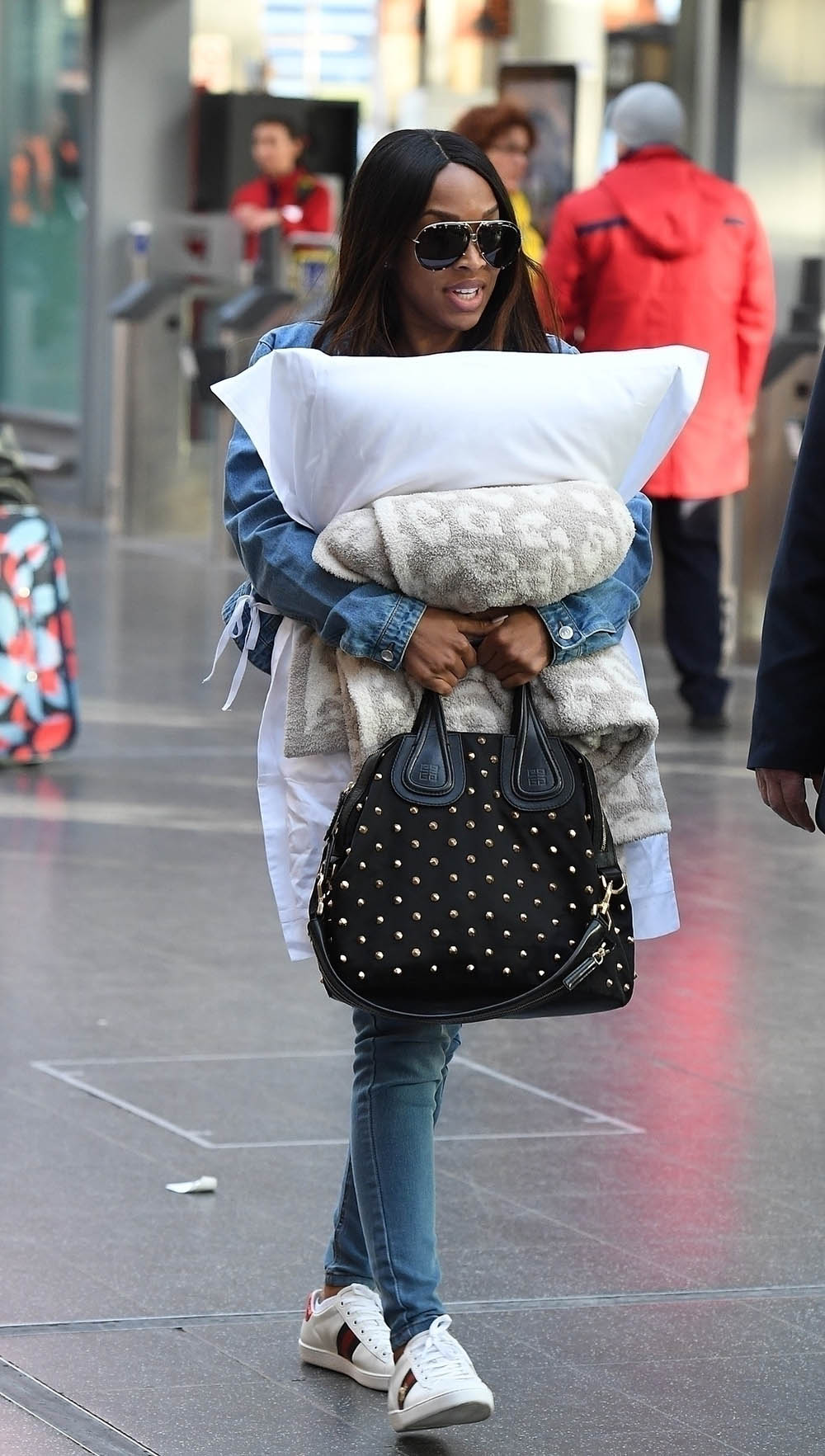 Malika Haqq seen arriving at Manchester Piccadilly Train Station