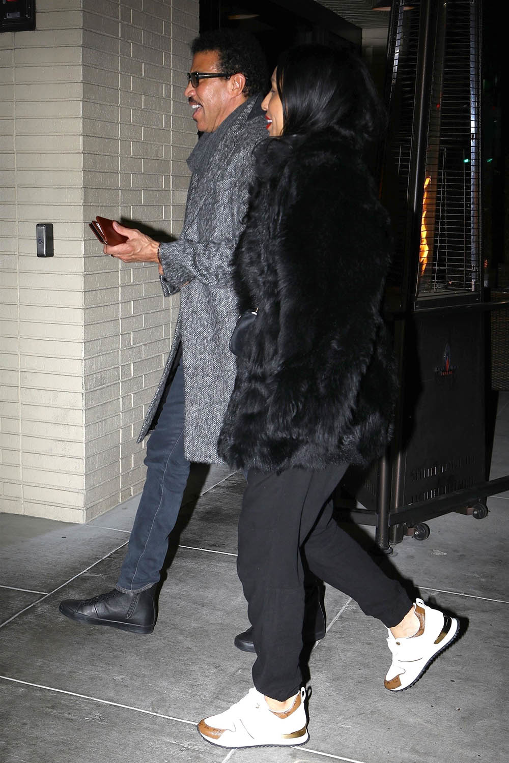 Lionel Richie and his girlfriend in Beverly Hills