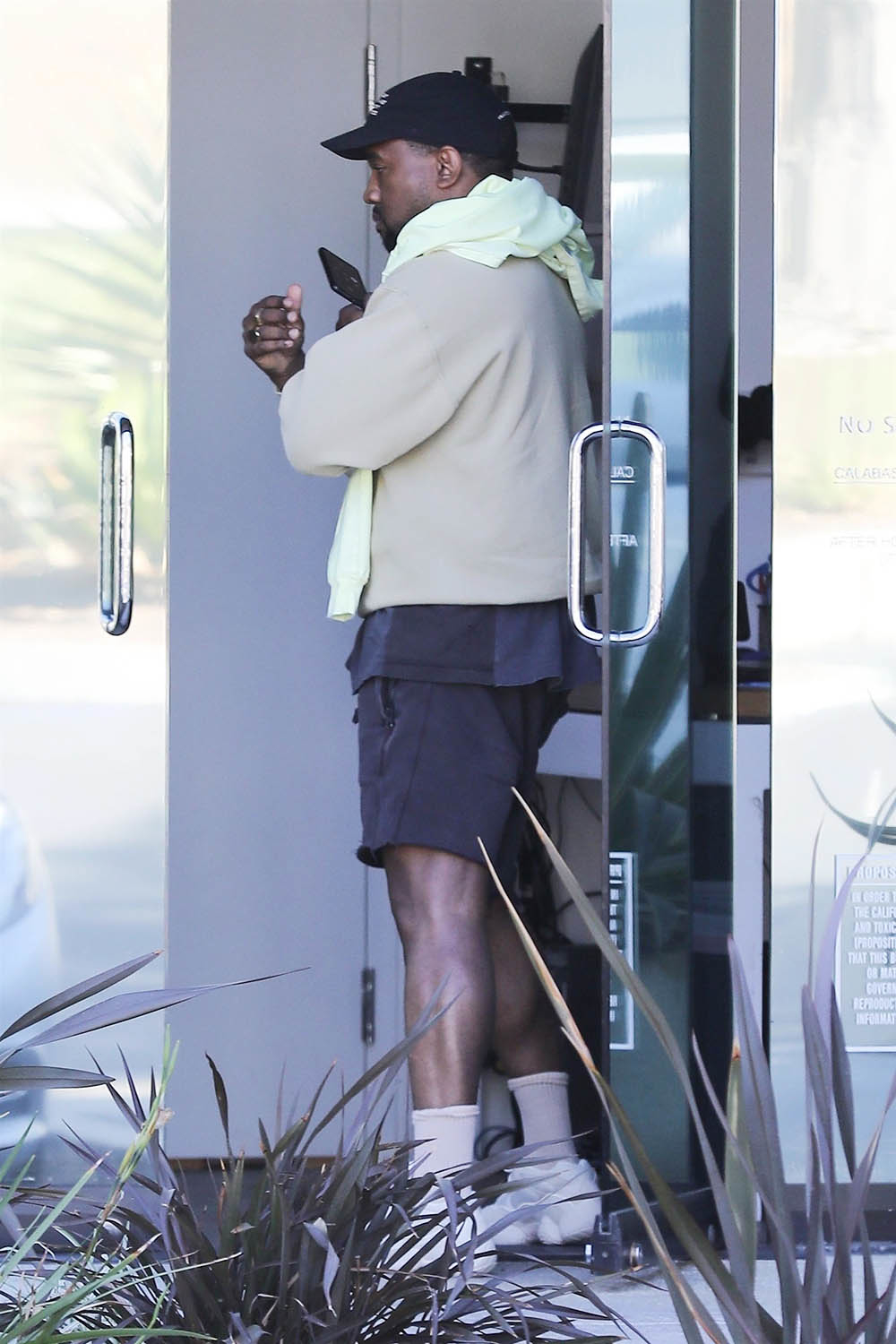 Kanye West arrives at his office in Calabasas