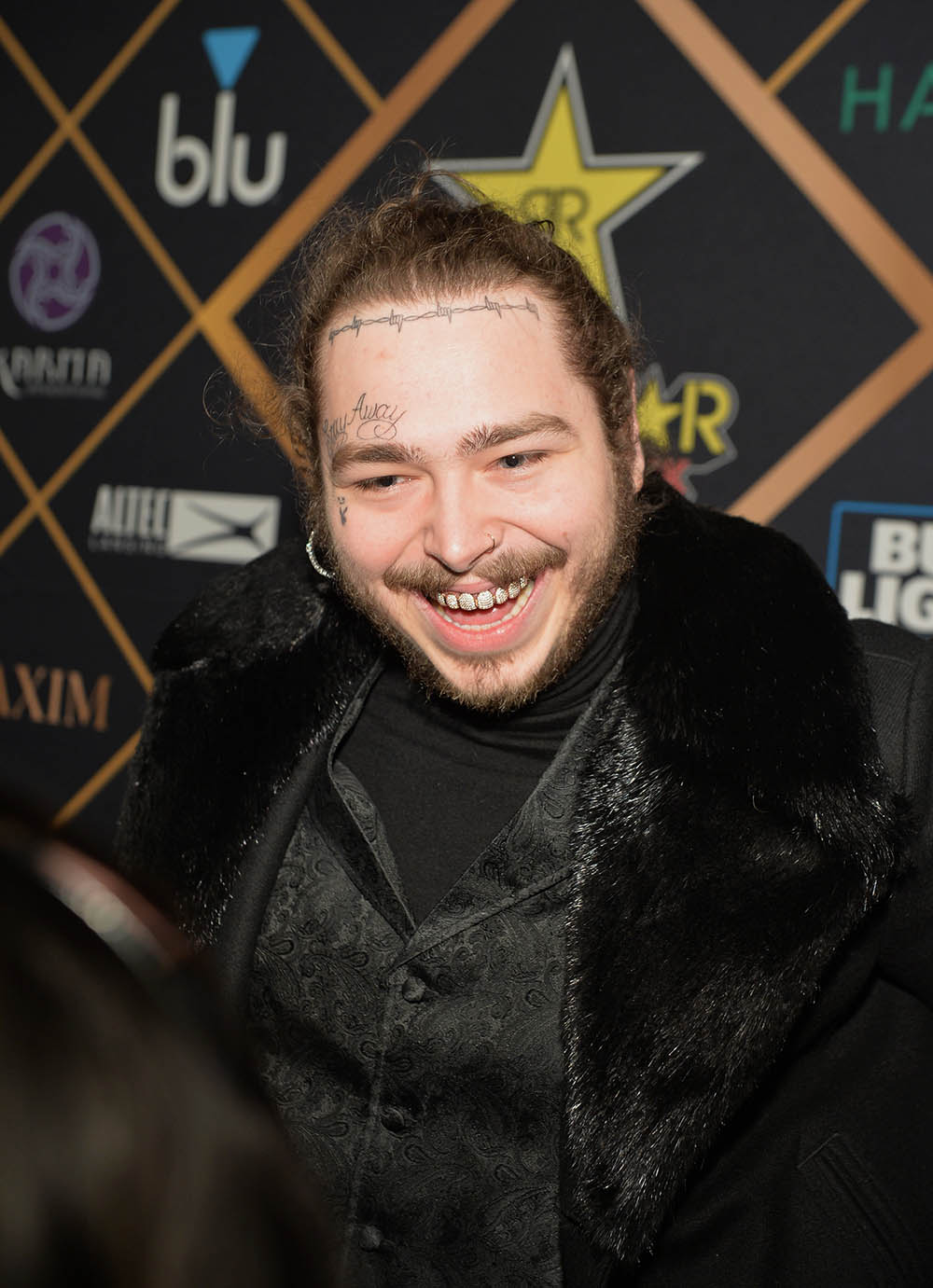 Post Malone attends the 2018 Maxim Party co-sponsored by blu