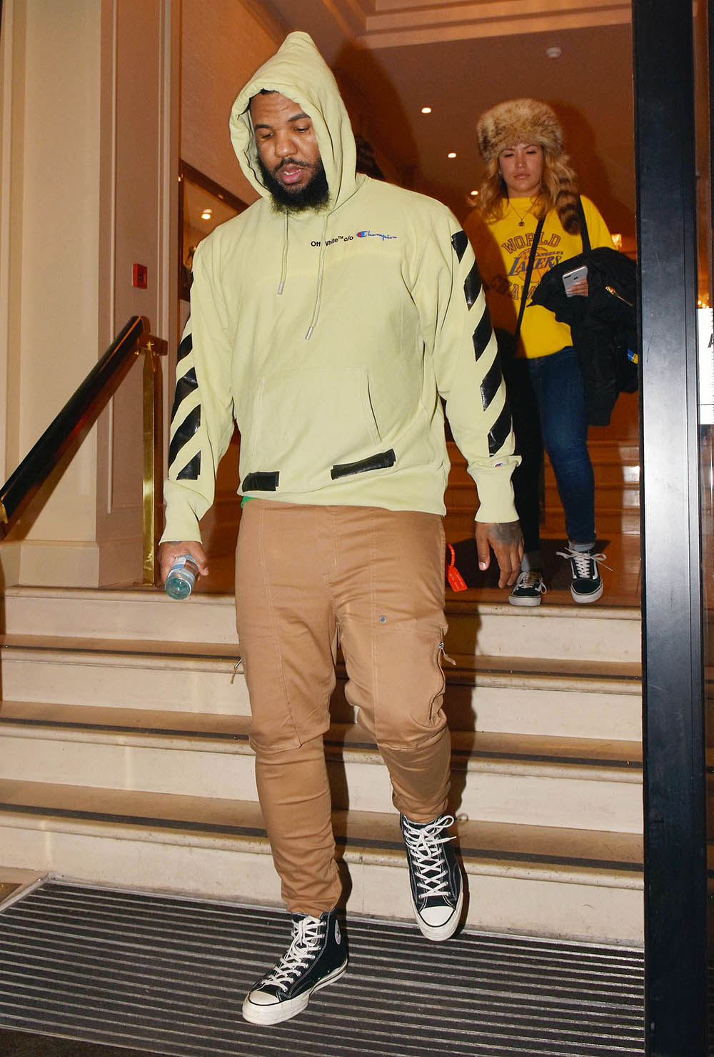 The Game wearing Off-White x Champion hoodie in Dublin, Ireland