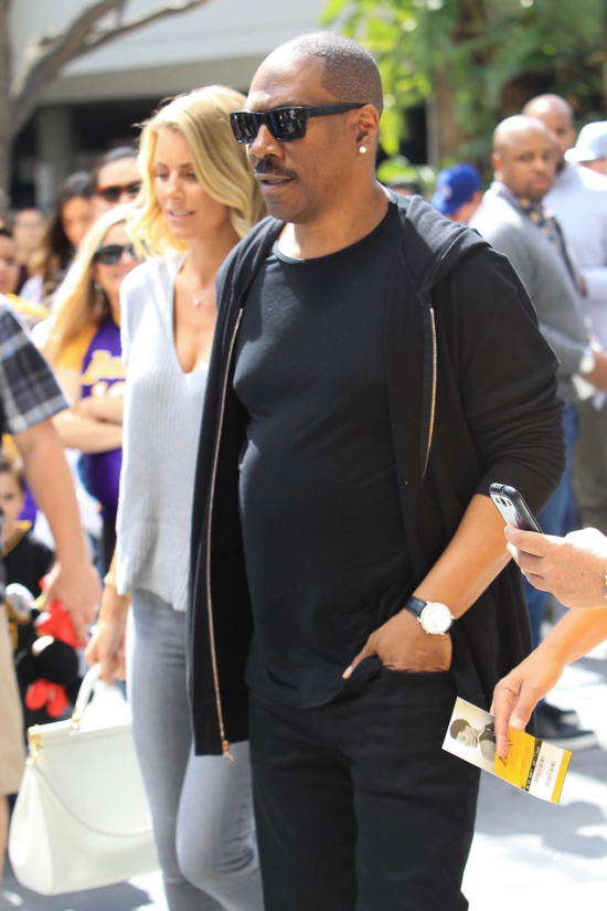 Eddie Murphy and Paige Butcher attend the Lakers game in Los Angeles