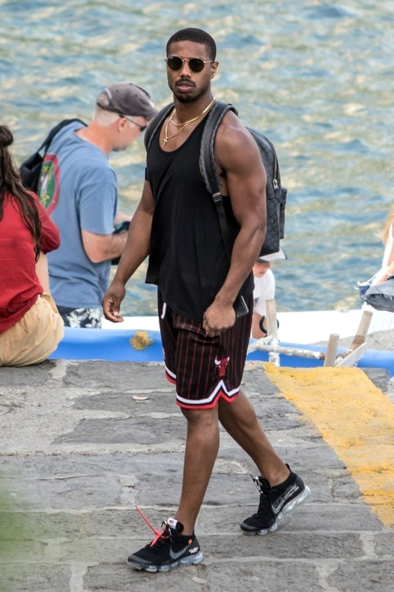 Black Panther and Creed star Michael B Jordan is pictured flexing his ...