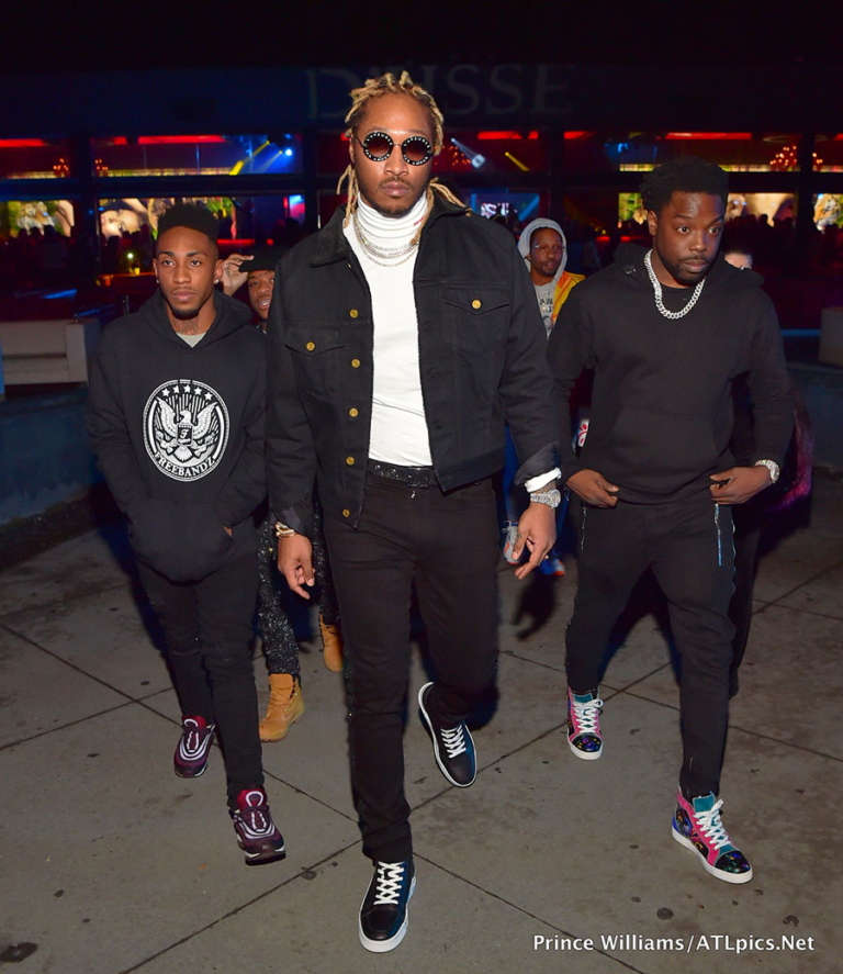 Rapper Future Hendrix, center, arrives at Mr. Ruggs’ Annual All-Black ...