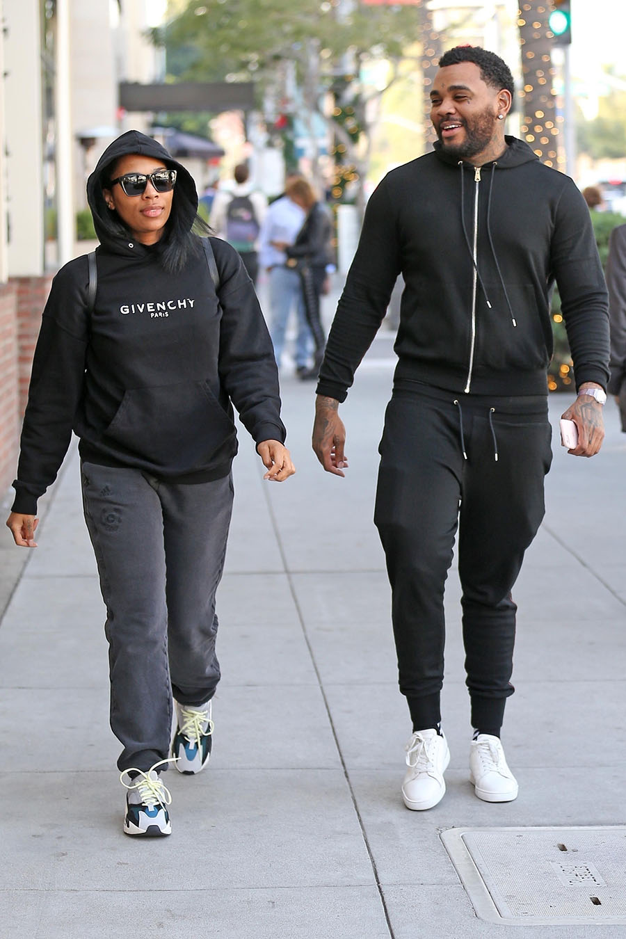 Kevin Gates runs errands with his wife Dreka Gates. The duo look trendy