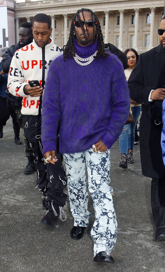 Chris Brown is all smiles while leaving the Mandarin Oriental Hotel in ...