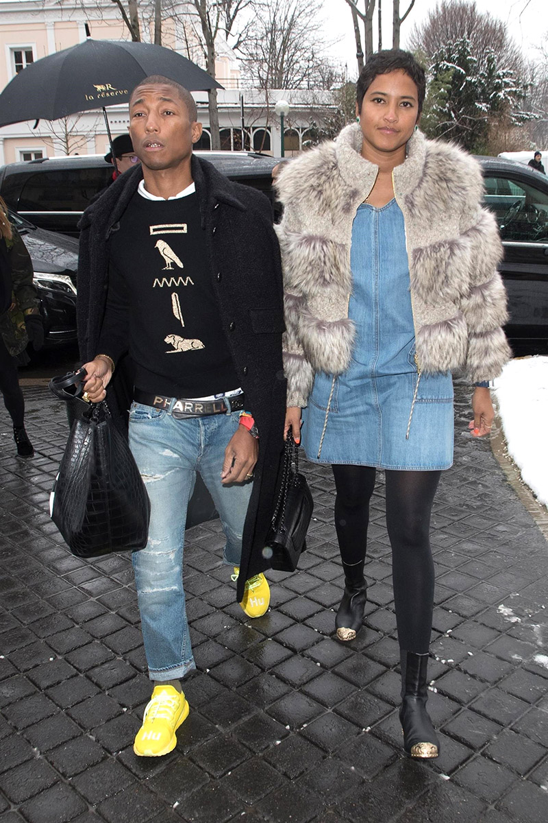 Pharrell Williams and Helen Lasichanh arriving to the Chanel show