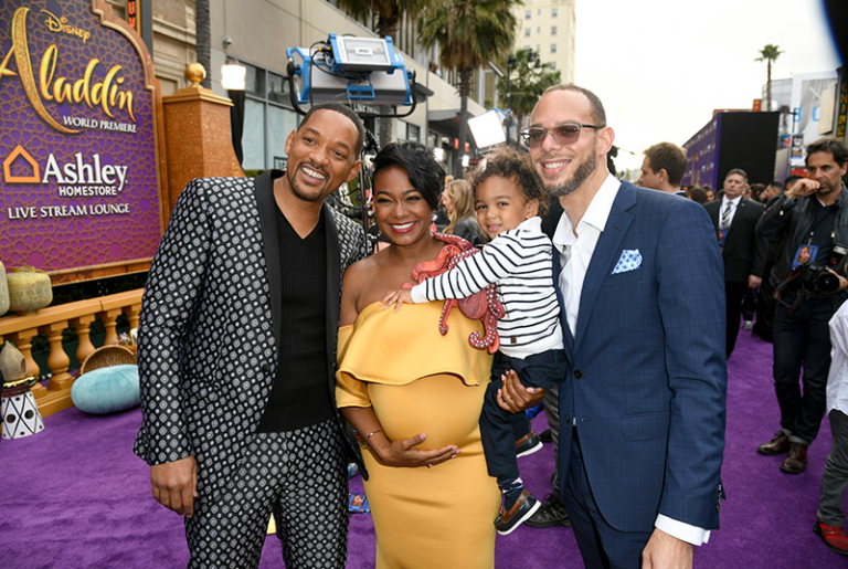 Tatyana Ali, husband Vaughn Rasberry, son Edward Rasberry attend Disney ...