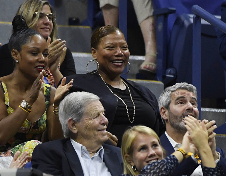 Queen LAtifah (R) and Eboni Nichols sit in the stands at the US Open ...