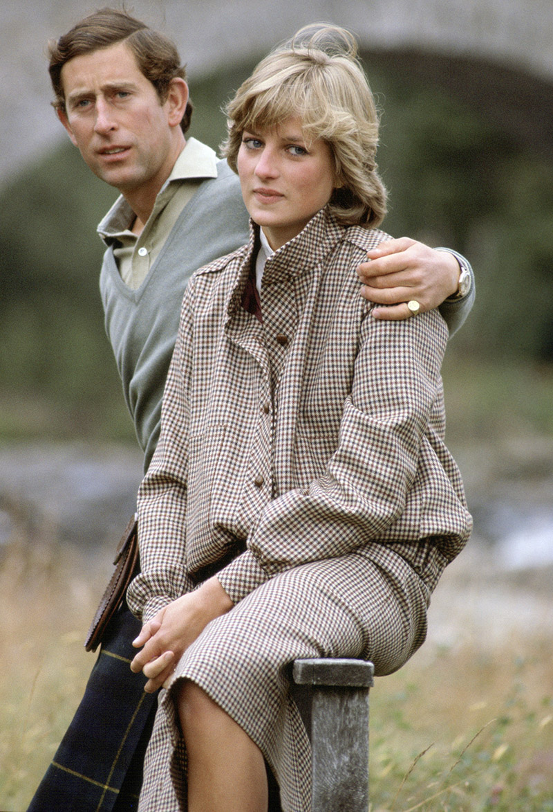 Prince Charles With His Arm Around Princess Diana As They Sit On A ...