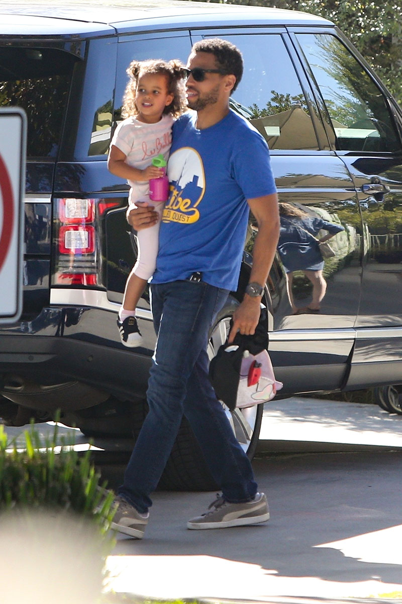 *EXCLUSIVE* Michael Ealy cradles his daughter and buckles her up inside