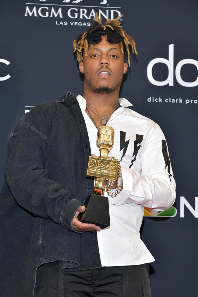 Juice Wrld poses with the award for Best New Artist in the press room